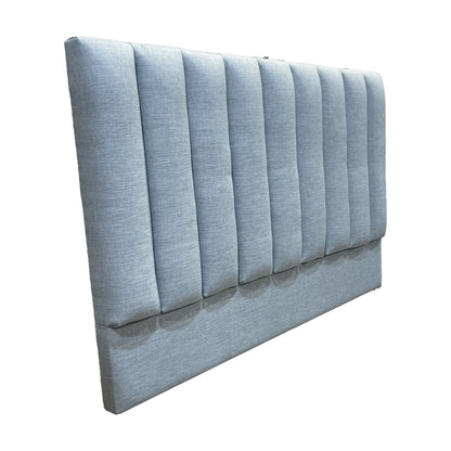 Panel Bed Head in blue fabric - side view, studio shot